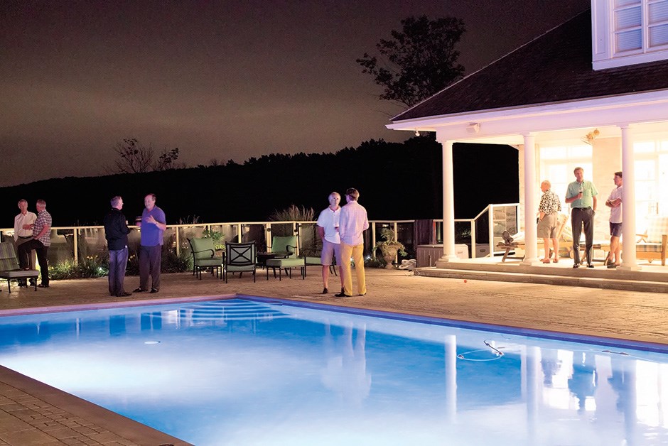 Dinner conversation on the pool deck at Rennie Estate