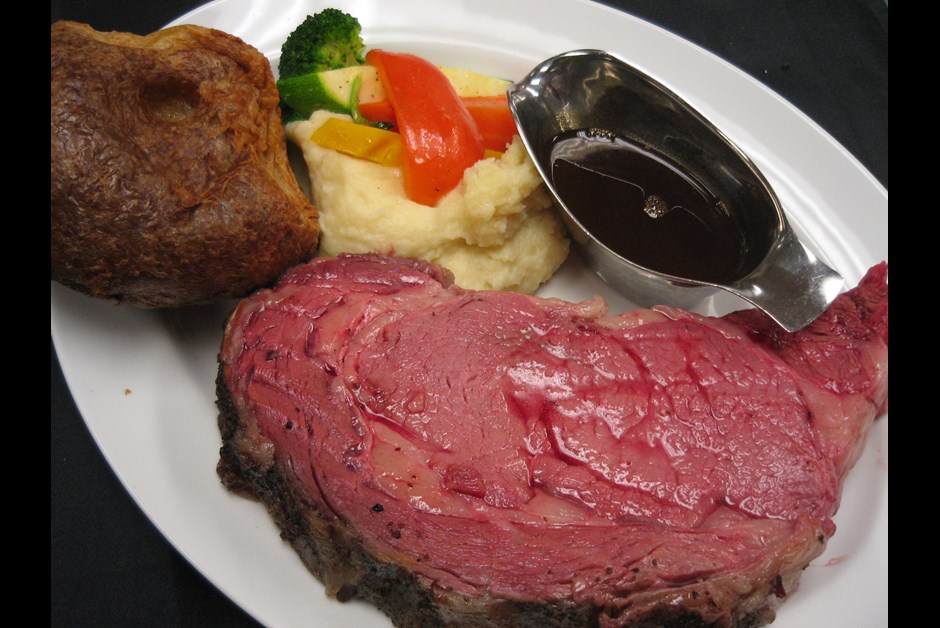 Signature AAA Alberta Prime Rib 12 ounces, classic jus, Yorkshire pudding, market vegetables, choice