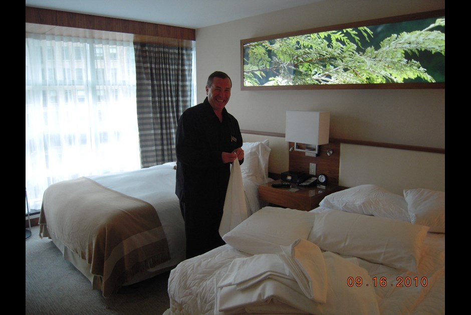 General Manager, Randy Zupanski making beds