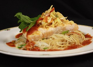 Grilled salmon, rice noodles, Asian slaw, tomato jus