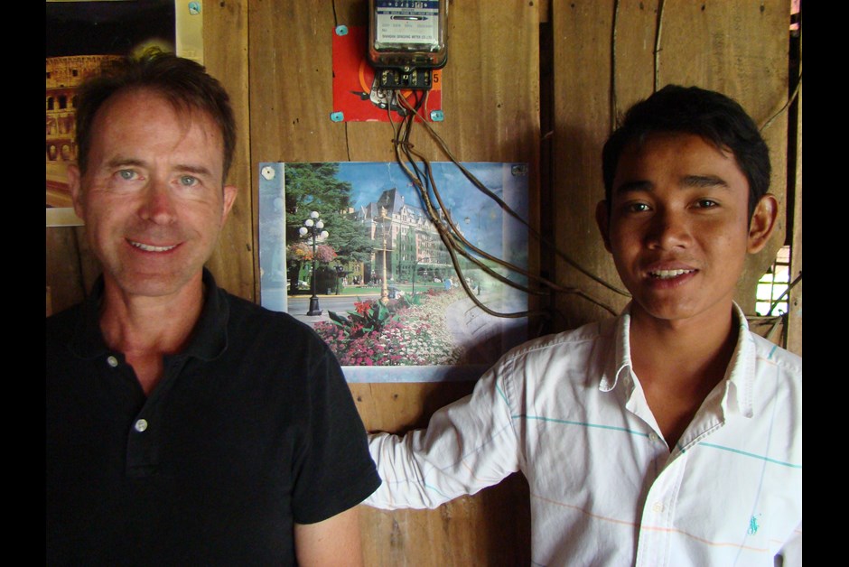 Photo of Fairmont Empress on wall of home in Kampong Chhnang, Cambodia