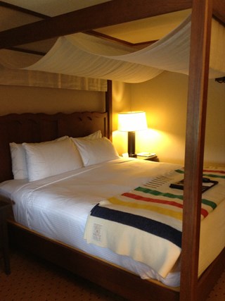 Cozy canopy bed at Fairmont Tremblant
