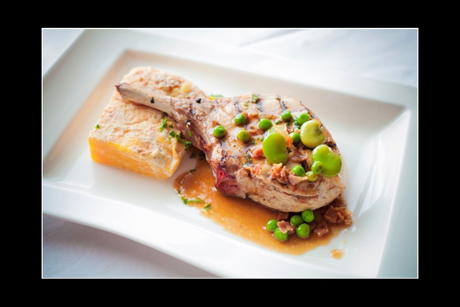Grilled Pork Chop served with Apple Calvados Jus & Pumpkin Gratin – from The Newport, a Gastropub