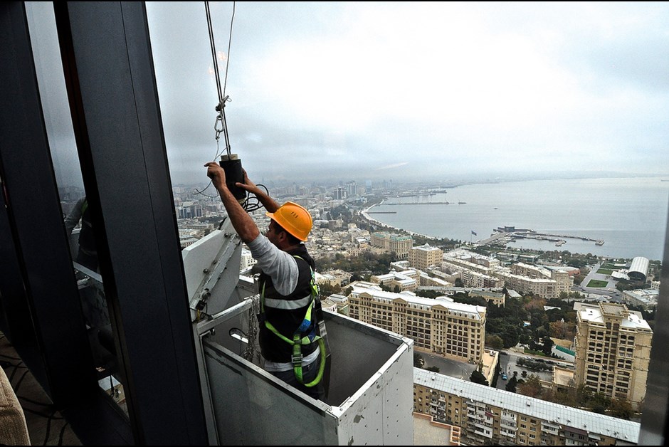 Cleaning the windows on the 19th floor