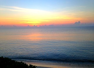 A beautiful sunrise by the beach @FairmontMYK! 