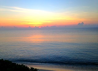 A beautiful sunrise by the beach @FairmontMYK!