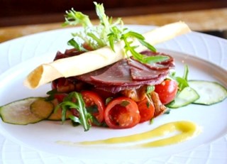 Chanterelle bresaola salad with cherry tomatoes