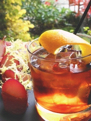 Red Wine Poached Pear Wrapped in Prosciutto with Frisée & Orange Mascarpone Paired with a Negroni