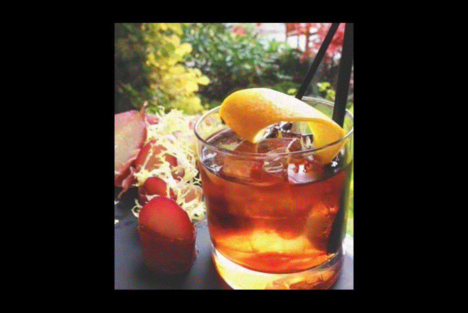 Red Wine Poached Pear Wrapped in Prosciutto with Frisée & Orange Mascarpone Paired with a Negroni