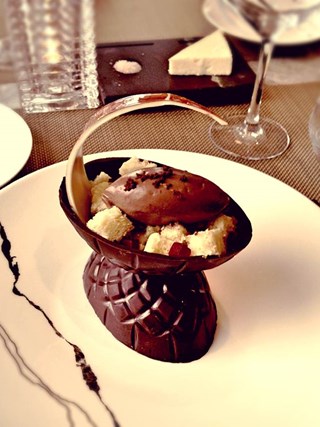 white chocolate and orange flavored Easter egg with maple crémeux