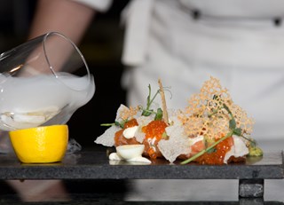 Salmon tartare with guacamole and truffle sauce