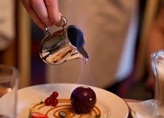 Chocolate Sphere "Romanoff" flambe