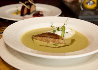 Asparagus cream soup with foie gras and cr&#232;me fraiche