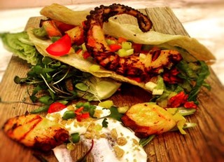 Grilled octopus and smoked chicharon tacos