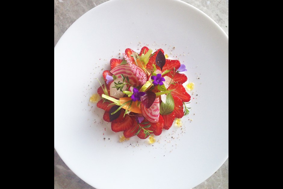 Honey glazed scallops with strawberries and chef's garden herbs salad