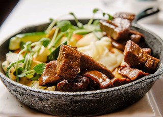 Guinness Braised Veal Breast with Parsnip Mash, Glazed Vegetables and Natural Jus