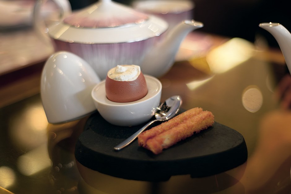 Appetiser of black truffle scrambled eggs with crispy bread soldiers at Anti:dote