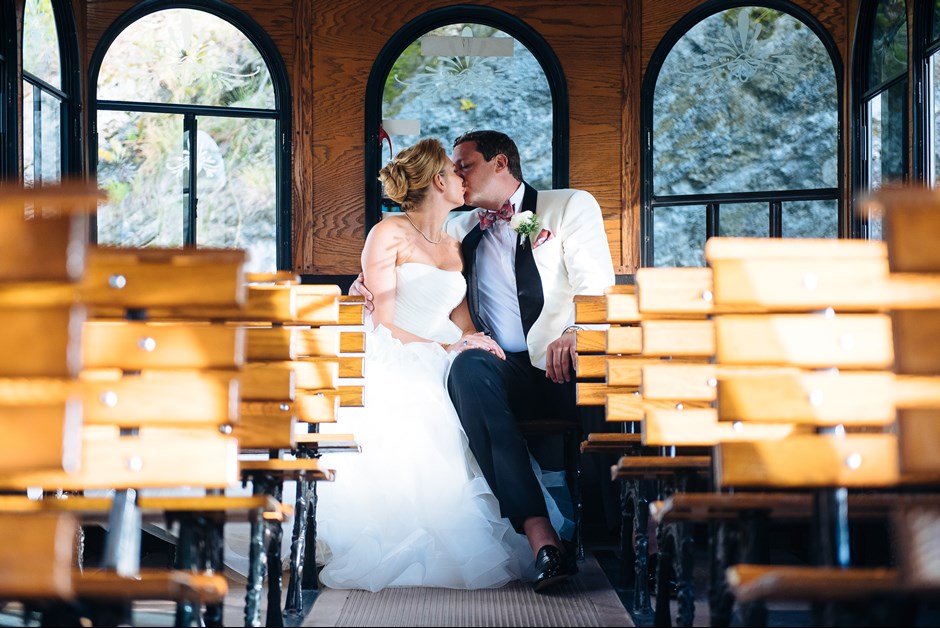 Bride and Groom in the blue Fairmont trolley 