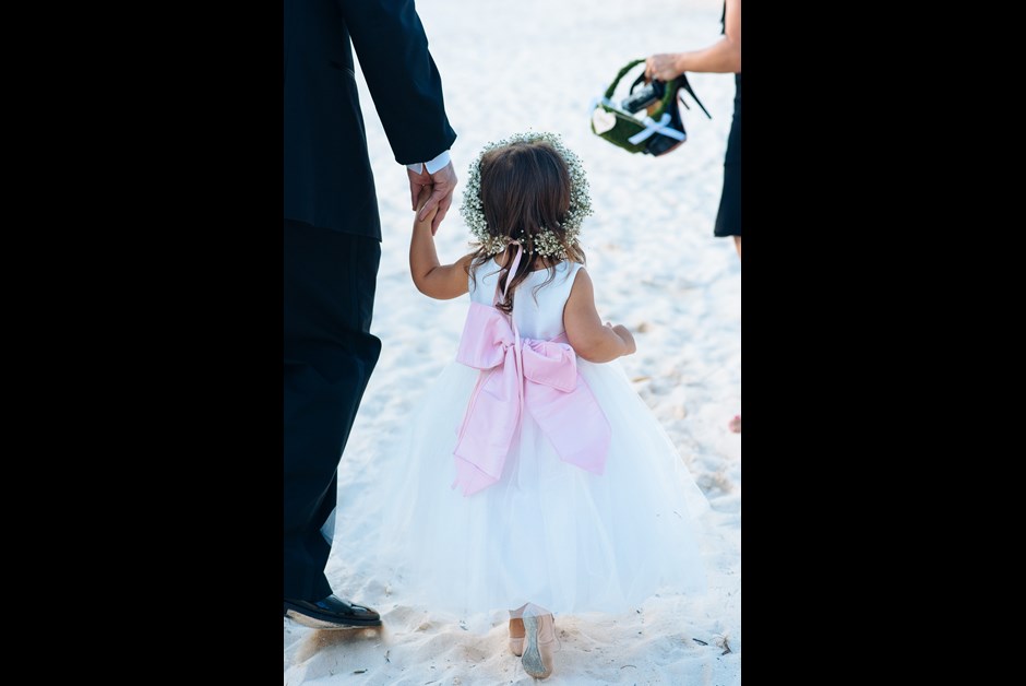 Flowers Girl on her way to dinner at Ocean Club
