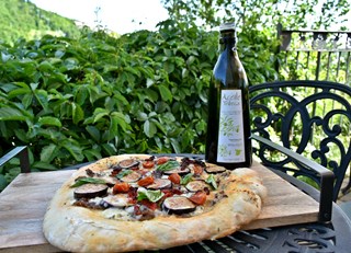 Focaccia Bread Pizza with Duck Confit, Figs, and Roquefort Cheese             