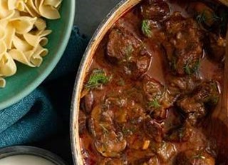 BEEF GOULASH WITH BUTTERED NOODLES