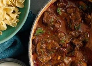 BEEF GOULASH WITH BUTTERED NOODLES